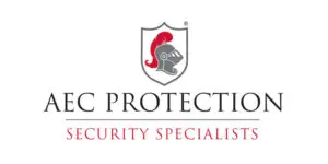 Logo for AEC Protection Security Specialists featuring a knight’s helmet in a shield above the company name, “AEC Protection,” in bold black and red text.