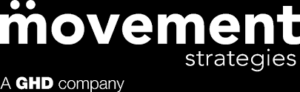 White movement strategies logo with “A GHD company” below on a black background, inspired by the expertise of Dr Aoife Hunt MBE, 2024.
