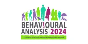Silhouettes of people are positioned above the text “Behavioural Analysis 2024, 21-23 May, Gtech Stadium, Brentford, London,” capturing the collaborative spirit of this leading Behavioural Analytics event.