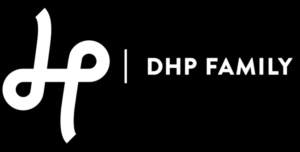 White stylised dhp logo on the left, vertical line, and DHP FAMILY in bold uppercase letters alongside Julie Tippins and 2024 on a black background on the right.