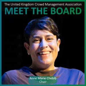 A person with short dark hair smiles at the camera. Text reads: The United Kingdom Crowd Management Association, Meet the Board Members, Anne Marie Chebib, Chair.
