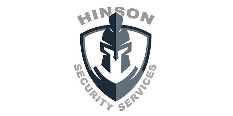 Logo for Hinson Security Services featuring a Spartan-style helmet inside a shield, with the company name “Hinson Security Services” curved above and below the emblem, reflecting the strength and reliability of our security services.