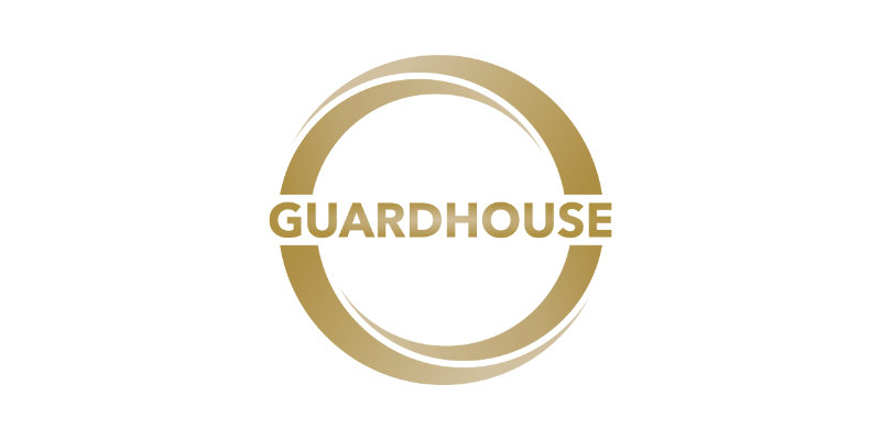 Gold circle with the word GUARDHOUSE in bold, uppercase letters centred inside on a white background, representing Guardhouse Europe and its trusted security services.