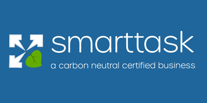 Smarttask logo with white arrows, a green leaf, and the text a carbon neutral certified business on a blue background.