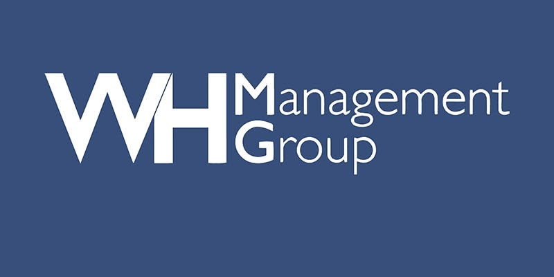 WH Management Group logo with bold white letters WHMG on a blue background, and Management Group written in smaller white text to the right, reflecting the professionalism also seen in WH Security Ltd’s branding.