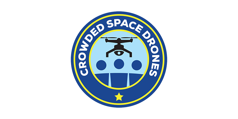 Circular logo featuring a drone above three blue circles, set against a blue background with a yellow border. The text “CROWDED SPACE DRONES”—representing industry-leading drone services—encircles the edge, complemented by a single yellow star at the bottom.